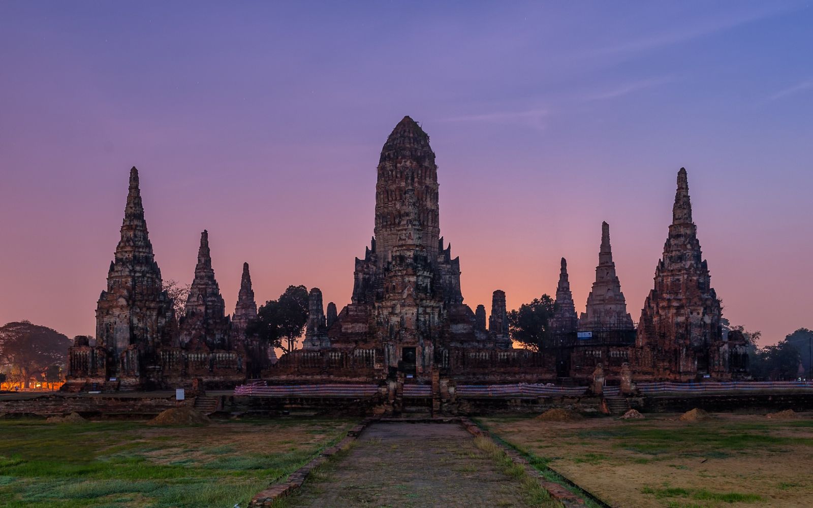 Wat Chaiwatthanaram in Ayutthaya, the main prang and its satellite prangs at dusk
