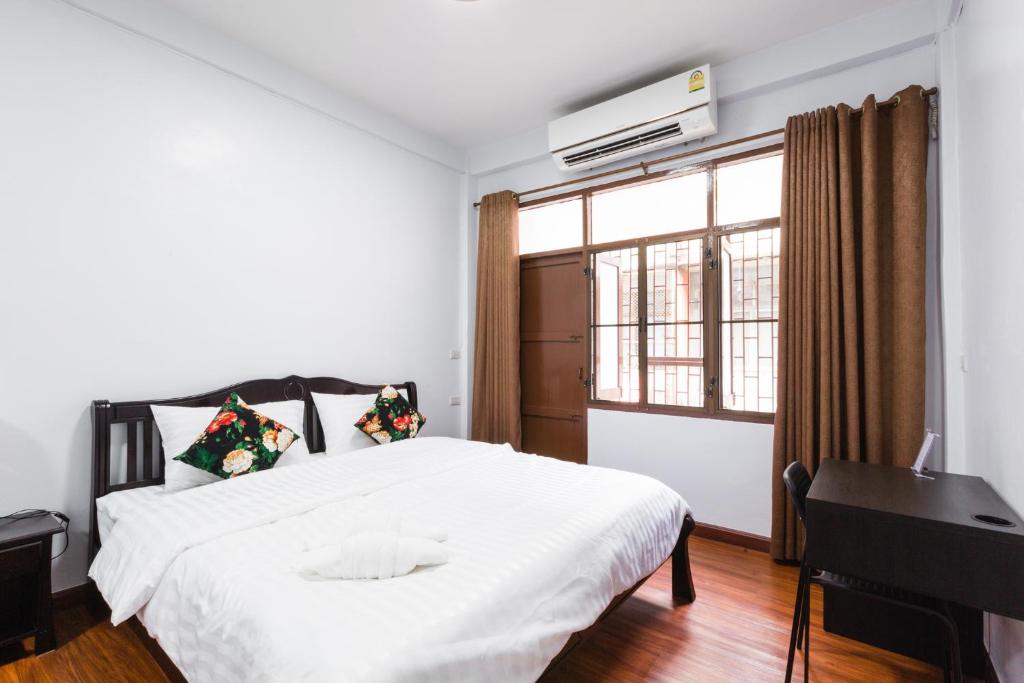 Bedroom by a large window